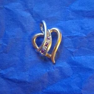 10 Kt Yellow And White Gold Heart Charm Accented With Rubys And Diamonss